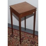 A mahogany corner washstand, with a single drawer flanked by dummy drawers, on splay legs, 103.