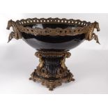 A gilt metal and blue pottery centrepiece,