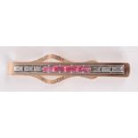 A post war Soviet gold 875 purity tie clip, Sverdlovsk town mark, set with pink stones.