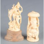 An Indian ivory chess piece, in the form of Ganesh seated on a throne, height 9cm,
