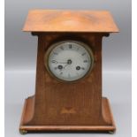 An Art Nouveau inlaid oak mantle clock,