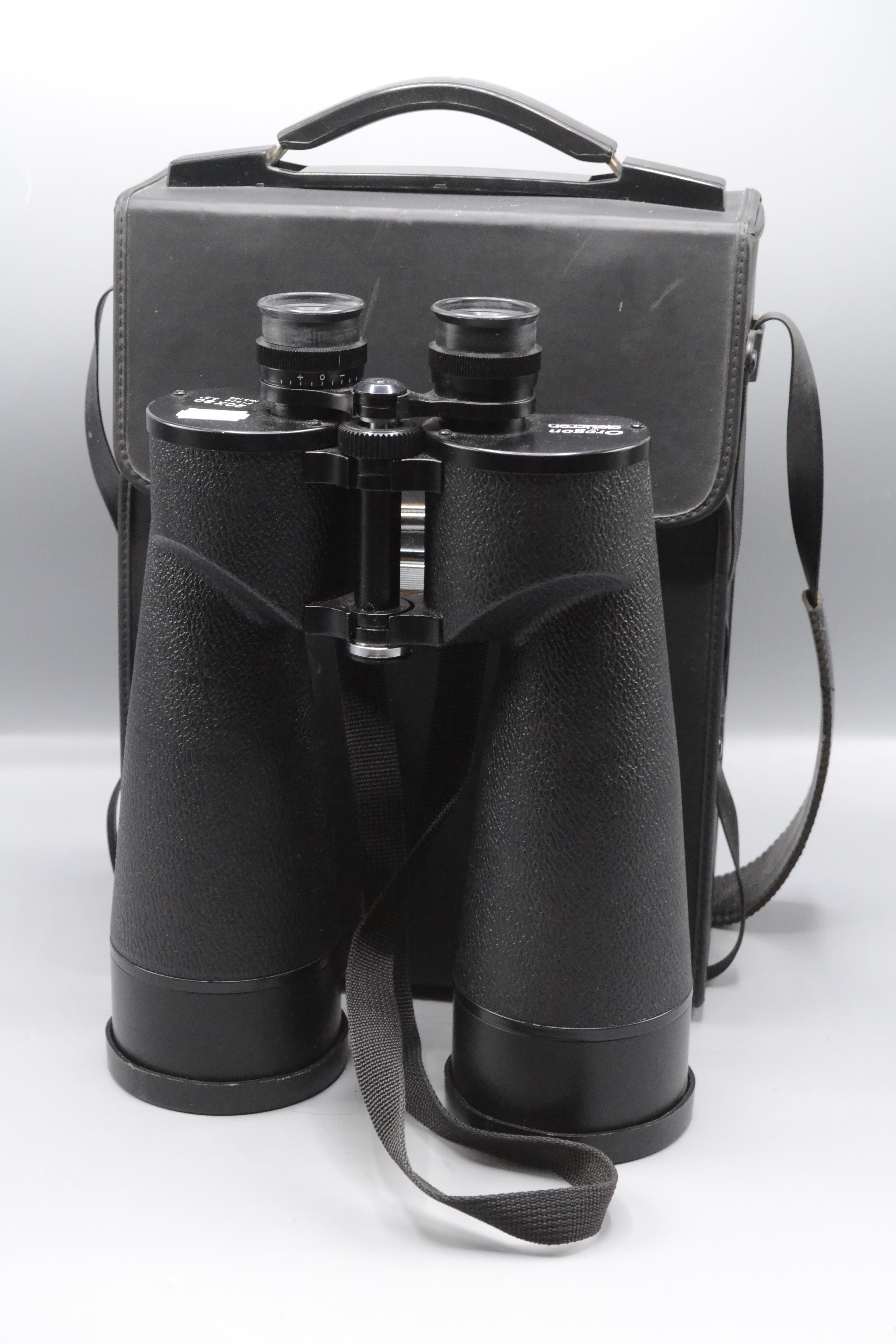 A pair of Oregon by opticron binoculars, 20 x 80 field 3.5 No.8129, height 31cm, width 23cm.