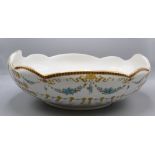 A large The Foley 'Faience' fruit bowl, decorated with floral swags, height 14.