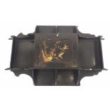 A Japanese black lacquered wall cabinet, the panelled door with gilt decorated birds,