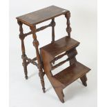 A mahogany and beech metamorphic stool/library steps, 20th century, folded height 74.5cm, width 50.