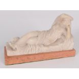 An alabaster figure of a reclining Cleopatra, on a rectangular marble base, height 13cm, width 22cm,