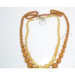 A long string of graduated 'amber' beads.