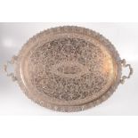 An Indian silver plated oval twin handled tray,