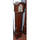 A pre-war burr walnut veneered grandmother clock, the engraved silvered dial signed T S Cuthbert,