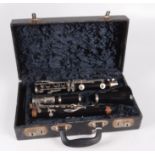 A Boosey & Hawkes of London Regent clarinet in a fitted, velvet lined case.