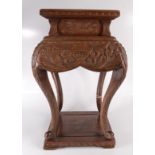 A Chinese carved wood jardiniere stand, early 20th century,