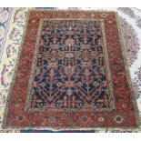 A North West Persian rug, the indigo field with an all over design of palmettes,