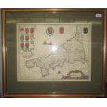 A hand coloured engraved map of Cornwall, by Blaeu, framed and glazed, size of map 40.4 x 51cm.