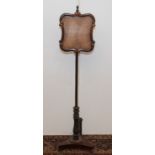 A Victorian mahogany and rosewood pole screen, height 149cm.