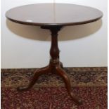 A George III mahogany tripod table,