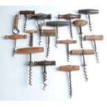 A selection of sixteen wooden handled corkscrews.