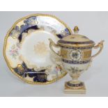 A Dresden porcelain campana shaped urn and cover, gilt decorated with floral sprays, height 18cm,