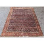 A Fereghan carpet, West Persia, the indigo field with the all over herati pattern,