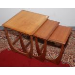 A G-Plan teak nest of three tables, 20th century, largest height 51cm, width 51cm, depth 49.5cm.