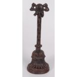 A Victorian cast iron doorstop by Archibald Kenrick & Sons No 44, height 35cm.