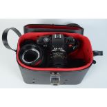 A Leica R5 camera, No.1788173, Leitz Wetzlar, Macro-Elmarit-R, with accessories in a fitted case.