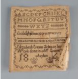A miniature alphabet needlepoint sampler,