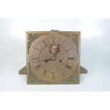 A brass longcase clock eight day dial, 18th century, inscribed 'Warminghm ASHTON',
