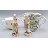 A porcelain twin handle mug, possibly Swansea, decorated with floral sprays, height 7cm, diameter 8.