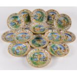 A set of sixteen Italian majolica Cantagalli plates, 19th century,