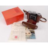 A Zeiss Ikon Super Ikonta camera, in a brown leather case, with original box,