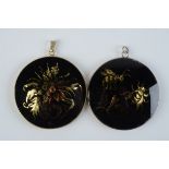Two silver and verre églomisé pendants by Frances Federer one showing a flowers and the other bees,