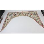 An Indian silk embroidered bed valance, 209 x 151cm.