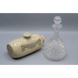 A mallet shaped cut glass decanter, 19th century, height 25cm and a Doultons Improved Foot Warmer,