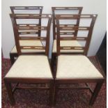 A set of four George III style mahogany dining chairs,