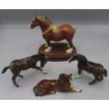 A Beswick shire horse, on an oval wooden plinth, height 19cm, length 18cm, width 9.