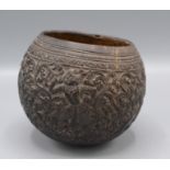 A carved coconut shell bowl, 19th century,