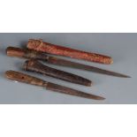 Two steel bladed knives, both with wire bound wooden handles, leather and wooden sheaths,