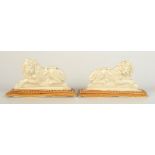 A pair of rare British stoneware figures of recumbent lions, early 19th century,