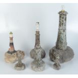 Six Cornish serpentine lighthouses, some converted to lamps, height of tallest 45cm.