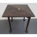 A carved oak triangular corner drop leaf table, 19th century,