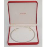 A 14ct reversible white and yellow gold collar necklace by Little Switzerland 25.5g.