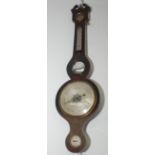 A George III rosewood wheel barometer, height 97cm.