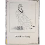 A David Hockney black and white poster, of a lady seated in a chair, 65 x 46.