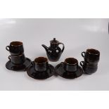 A Crowan Pottery tenmoku glazed part tea service, comprising a teapot,