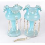 A pair of Victorian turquoise glass lustres, with floral over enamelled and gilt decoration,