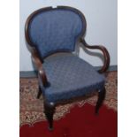 A mahogany upholstered armchair,