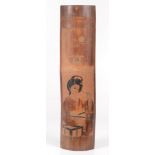 A Japanese bamboo wall plaque, decorated with a geisha and a rectangular seal mark, length 50.