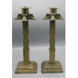 A pair of Indian brass candlesticks, 19th century,