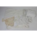 Five white cotton and lace nightdresses, two cotton and lace under garments,