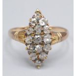 A Victorian diamond marquise form pave set ring in heart shaped box.